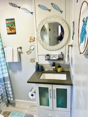 Hair dryer, towels, soap, toilet paper