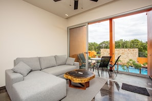 Outdoor dining - 3-bedroom condo in brilliant Tulum with AC and fitness room (Tulum)