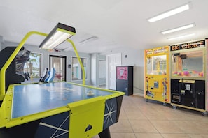 A pool table with a digital scoreboard, a toy chest arcade, and a vending machine. - The Summit 225 - Ocean Views & Beach Vibes (Panama City Beach)