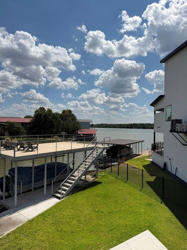 Brand new waterfront home on Lake LBJ! Great views, pool, boat dock & more!