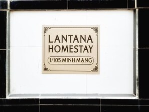 A sign for 'LANTANA HOMESTAY' with the address '1/105 MINH MANG'. - LANTANA Hue Homestay (Hue)