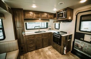 Unclassified image, 5 of 21, button - Modern Camper with Kitchen, Shower & A/C in Lake George (Lake George)
