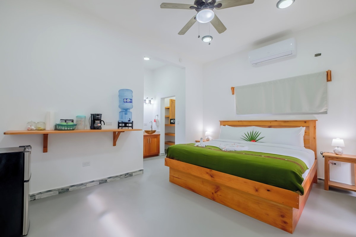 Luxury Suite, Pool View | In-room safe, laptop workspace, blackout drapes, soundproofing