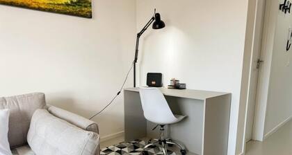 Cozy 1-bedroom condo in beautiful Centro Curitiba with AC