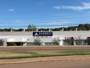 A large industrial building with a sign that reads 'EVEREST Mississippi's First Rural Education 6 Innovation Hub.' - 3 bdr 1 bath home in Water Valley. Close to Oxford Ole Miss and Tri lakes area. (Water Valley)