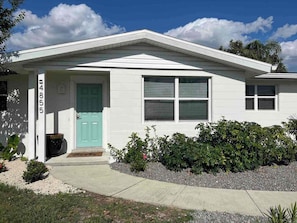 A single-story house with a front door, a mailbox, and a number '4855' on the wall. - Newly refurbished, private home with open layout and backyard (Sarasota)