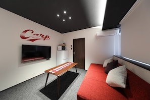 Quarto duplo luxo | Área de estar