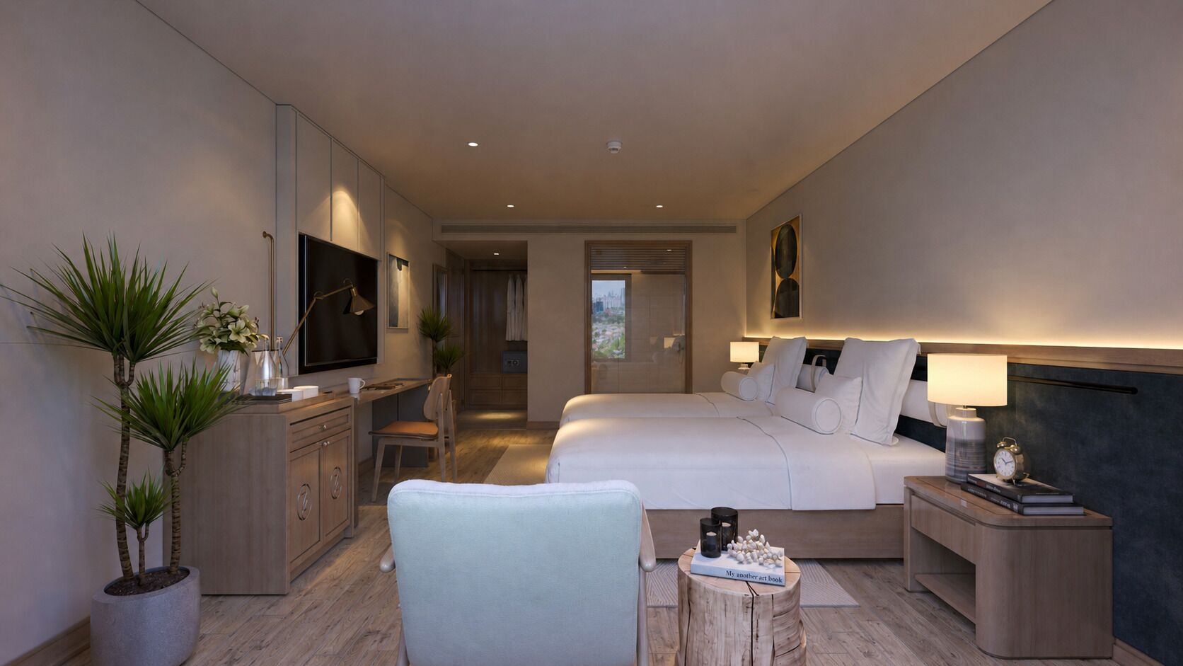 Una habitación de hotel moderna con cama, mesita de noche, lámpara y escritorio con silla.