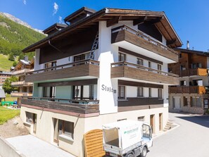 A multi-story building with balconies and a sign that reads 'Slalom.' - Haus Slalom by Interhome (Saas-Fee)