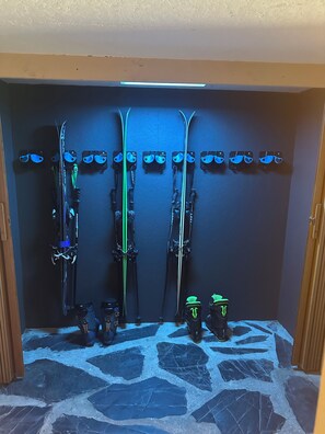 A ski storage area with skis and boots. - Lovely 4-bedroom house in Mendon perfect for your getaway (Mendon)