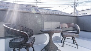 Suite Familiale, vue ville | Terrasse/Patio