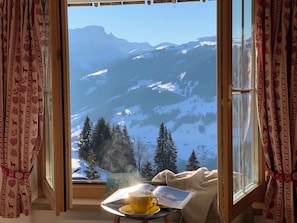 A room with a window overlooking a snowy mountain landscape. - Meieli Appartement/Fewo, Dusche oder Bad, WC, 1 Schlafraum 2-Bett-Wohnung by Interhome (Lenk)