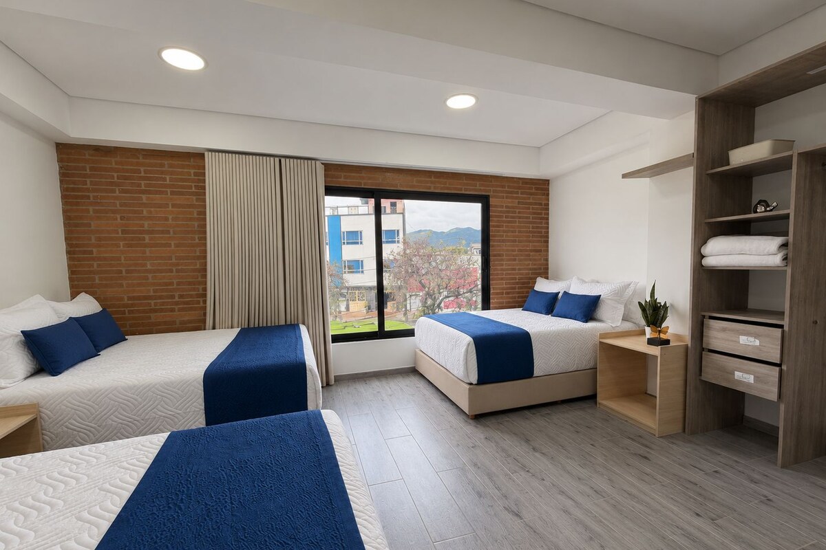 Family Room | Premium bedding, down comforters, minibar, desk