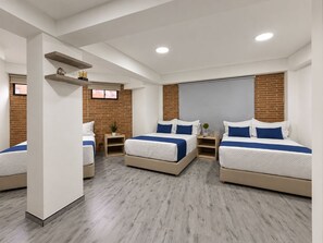 Family Room, Multiple Beds | Premium bedding, down comforters, minibar, desk - Hotel Embajada 47 (Bogota)