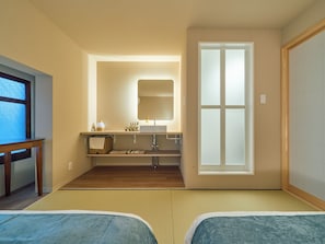 A hotel room with a wooden floor, a large window, a sink, a mirror, and two beds. - Entire Building Rental in the Tsutenkaku/Shinsekai Area | "Recharge" in a Private Sauna & Cold Plunge Pool | Accommodates up to 12 People (大阪市)