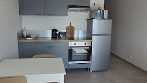 Dining - One-bedroom apartment right on the water, 5 minutes from St. Florent. (Patrimonio)
