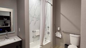 A bathroom with a bathtub, toilet, and sink. - 2 Queen Beds|Non-Smoking,Kitchen (Dallas)