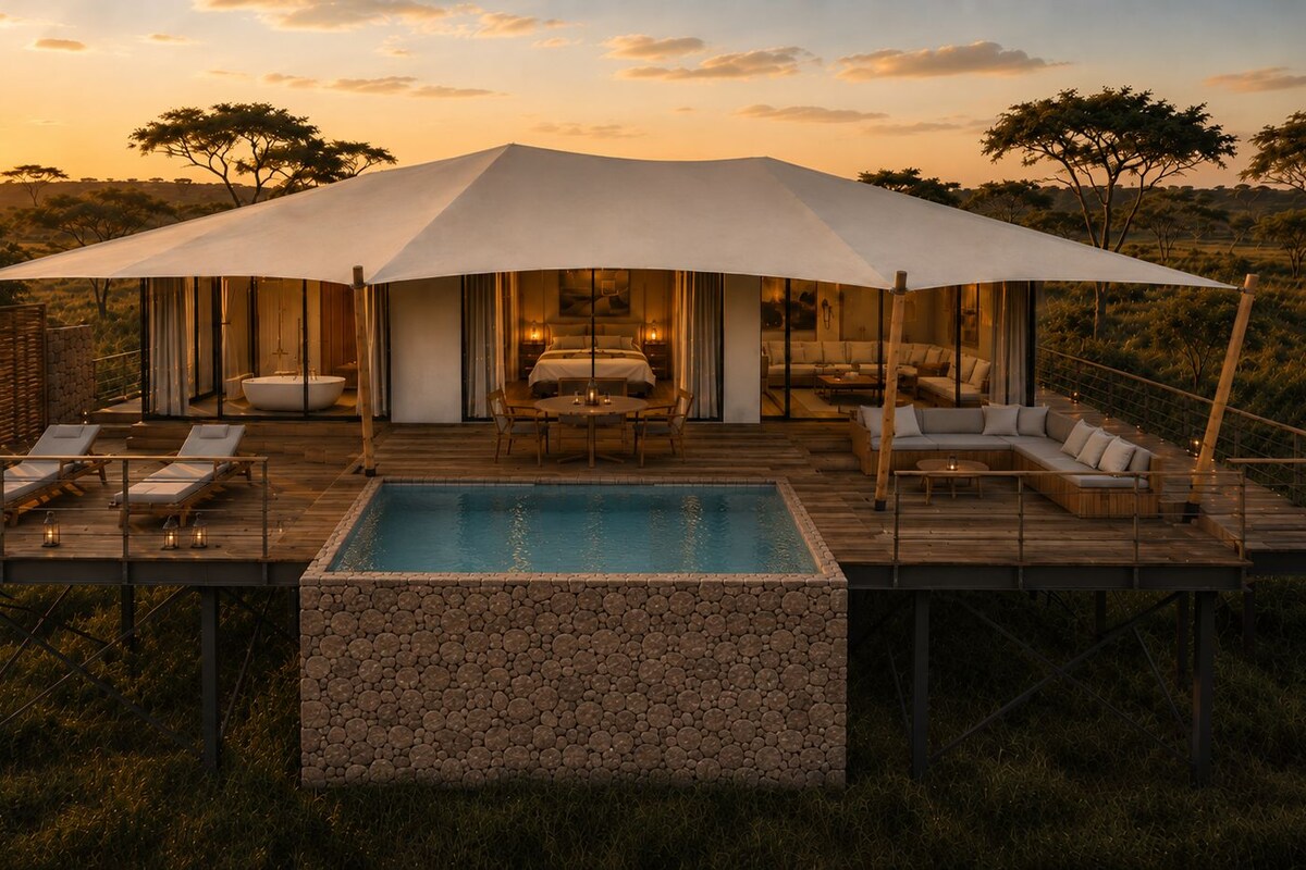 A luxurious outdoor suite with a pool, lounge chairs, and a covered seating area.