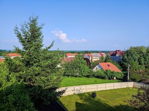 A residential area with houses, trees, and a clear sky. - Alsohegyi apartmanok by Interhome (Zalakaros-Thermal)