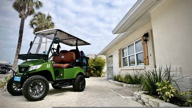 Unclassified image, 1 of 31, button - Castaway Cottage Beautiful Pool Spa Steps to Sand Restaurants Golf Cart Included (Holmes Beach)