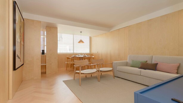 A modern living room with a sofa, chairs, a dining table, and a kitchen area. - Allegro Boutique Apartment 1C by Liiiving (Porto)