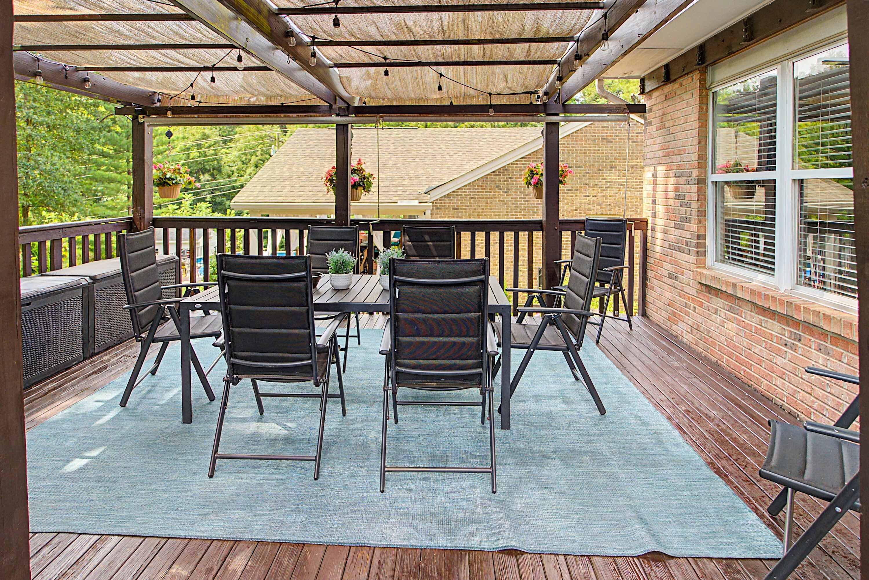 Lounge the day away or dine alfresco on the spacious deck​