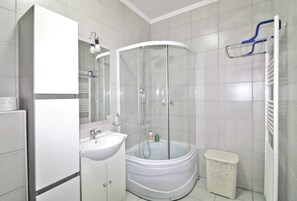 Shower, hair dryer, towels, soap