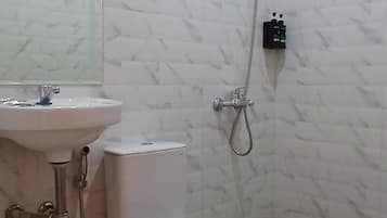 Shower, towels, soap, shampoo