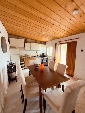 Dining - A stone retreat 40m from the sea, in a private 1,200m² estate on Aegina island. (Aegina)