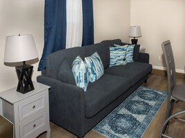 Apartamento, 2 quartos | Área de estar