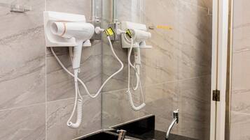 Standard Suite | Bathroom | Hair dryer, towels