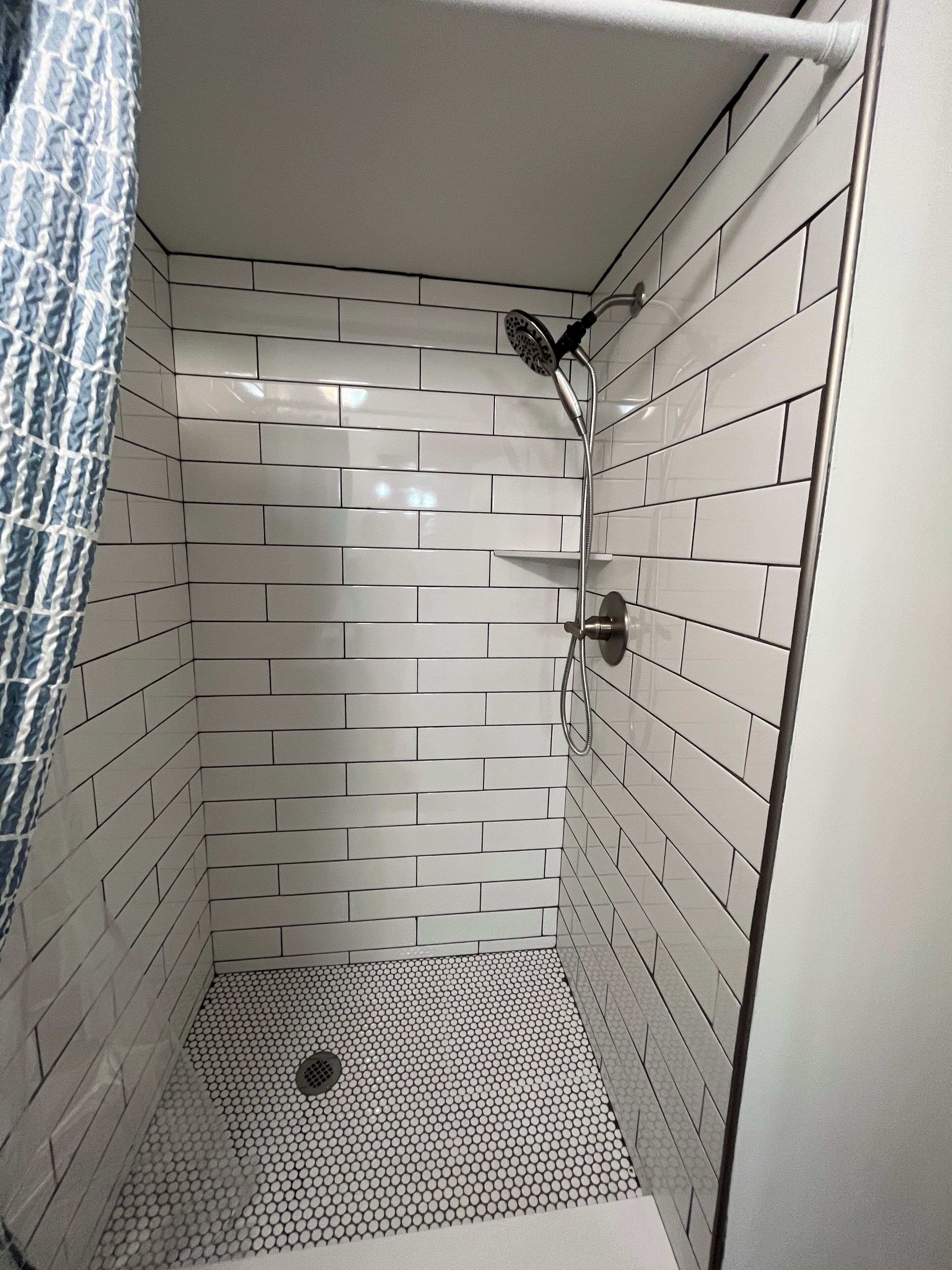 Shower, towels, toilet paper