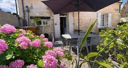 Charming 1880 Stone Family Home with Flowered Terrace