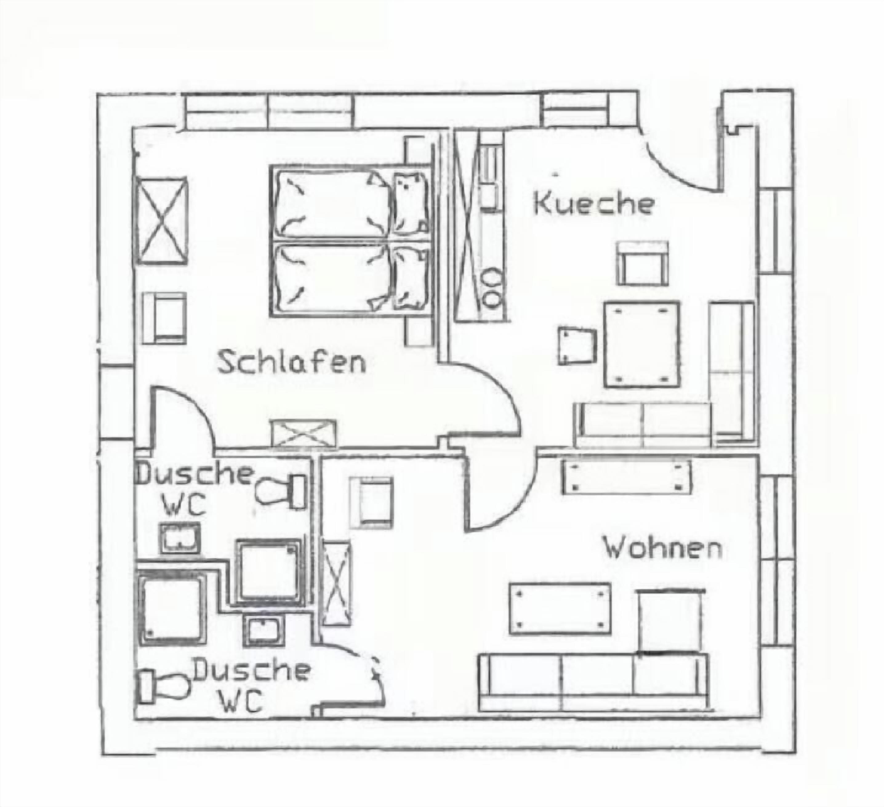 Ein Grundriss mit beschrifteten Räumen, darunter eine Küche, ein Wohnzimmer, zwei Bäder und zwei Schlafzimmer.