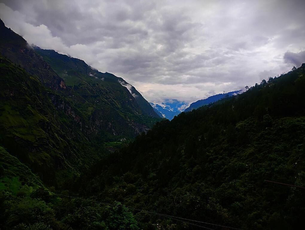 A mountainous landscape with a valley.