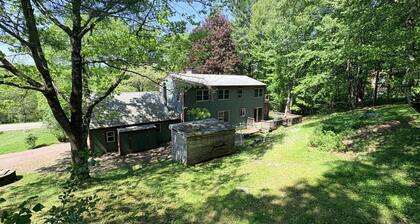 A 4BDR Family home in Essex Jct on a large wooded private lot w expansive deck and a treehouse!
