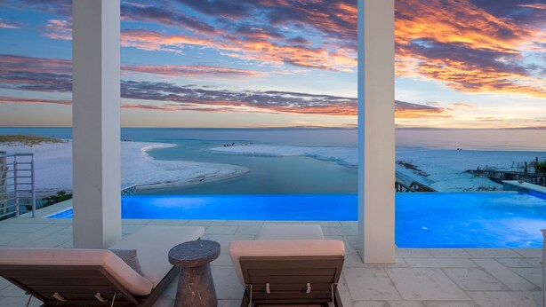 A pool area with a view of a beach and sunset. - Salt and Sunshine|Gulf Front Estate|Private Pool|Golf Cart (Santa Rosa Beach)