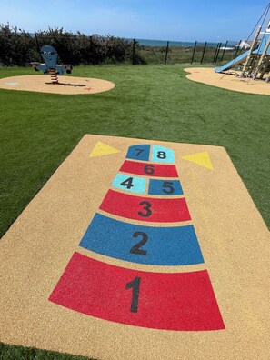 A playground with a number mat and a slide. - ☀️ Getaway with a sea view • Swimming Pools • Wild Coast (Les Sables-d'Olonne)