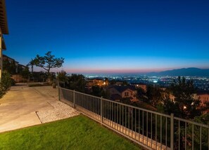 A residential property with a view of a cityscape at dusk. - Spacious house with amazing view (West Covina)