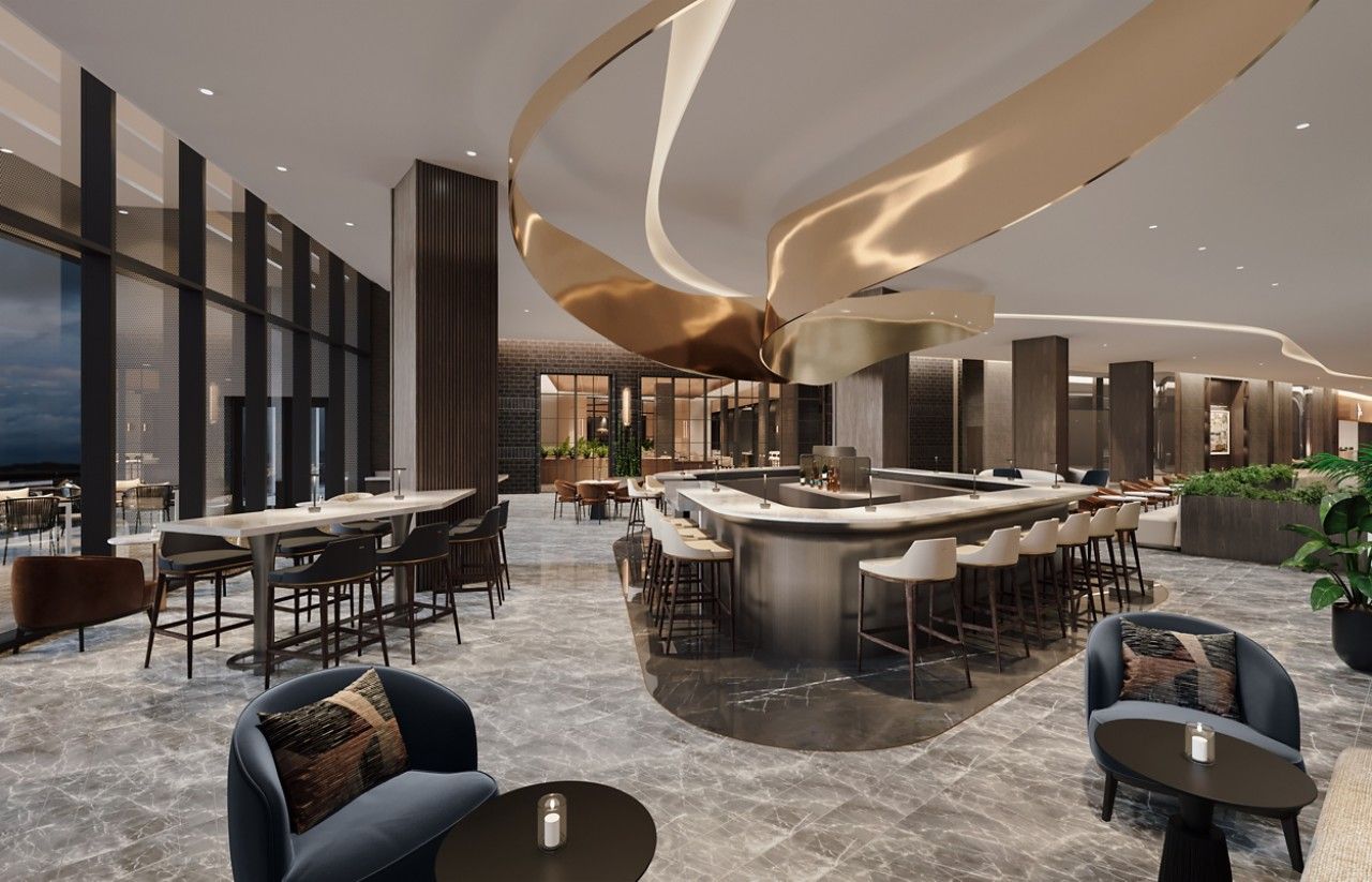 A modern bar area with a curved ceiling, seating arrangements, and a view of the outdoors.