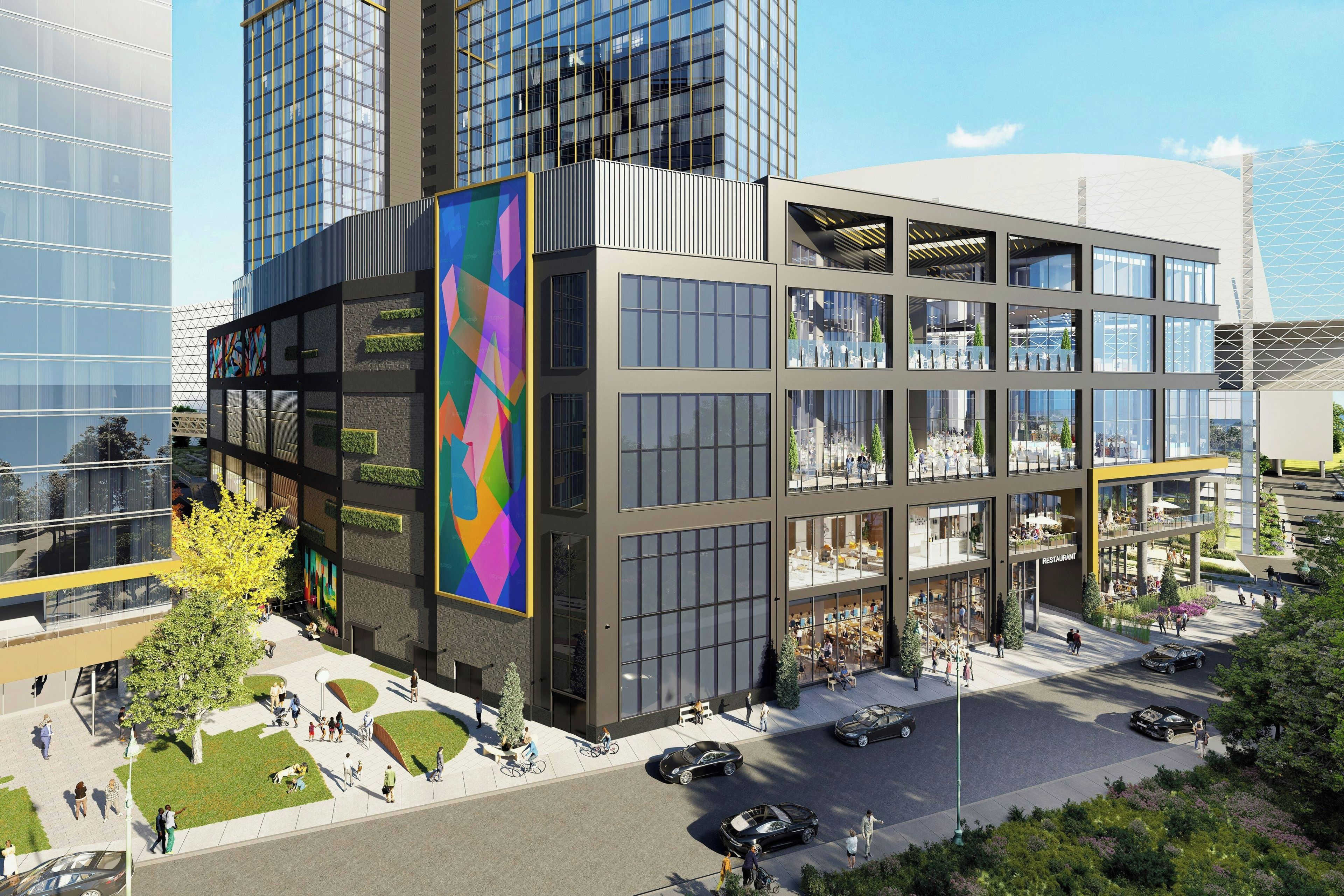 A modern building with multiple floors, large windows, and a central atrium.