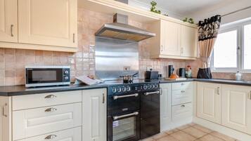 Microwave, oven, cookware/dishes/utensils