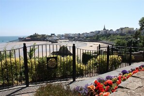A coastal view with a beach, promenade, and buildings in the background. - 1 Bed in St. Florence (oc-s33553) (Saint Florence)