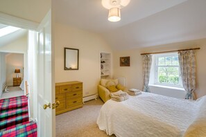 A bedroom with a bed, a dresser, a chair, a window with curtains, and a lamp. - 2 Bed in Newtyle (oc-b45543) (Newtyle)