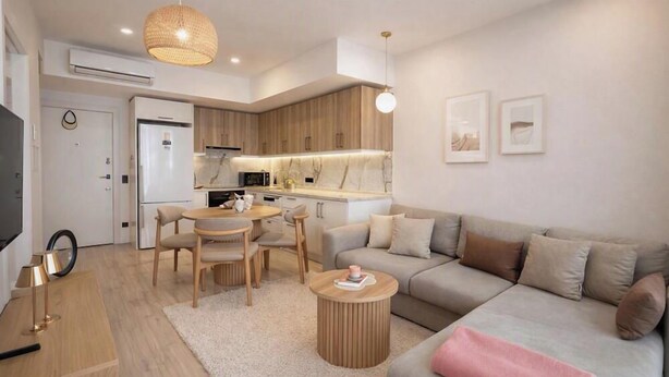 Uma sala de estar moderna com sofá, mesa de centro e área de refeições.