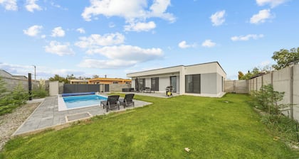 Klimatizovaný apartmánový dom, vyhrievaný bazén