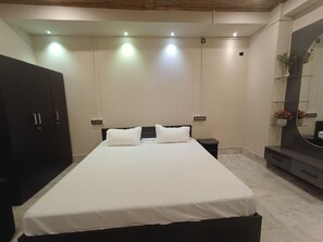 Unclassified image, 5 of 6, button - Cozy Room with Attached Bath & AC (Guwahati)