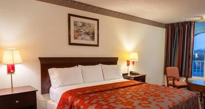 EXECUTIVE INN & SUITES US 59