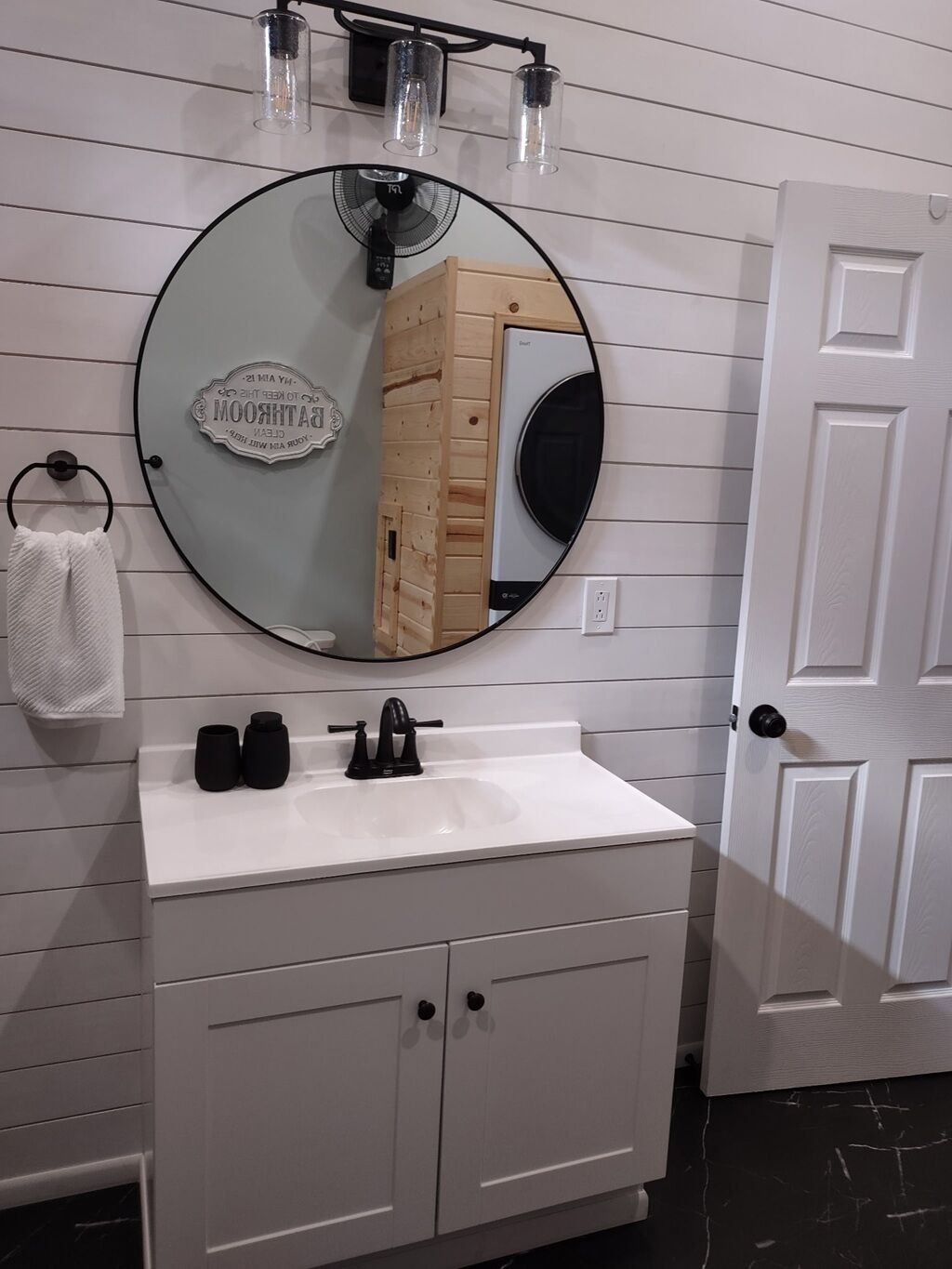 Shower, hair dryer, towels, toilet paper