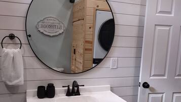 Shower, hair dryer, towels, toilet paper